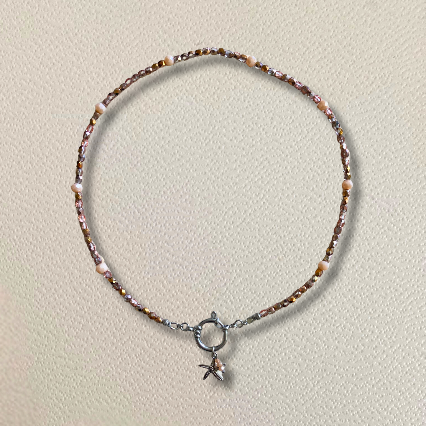 Collier argenté • charm étoile de mer rose cuivrée