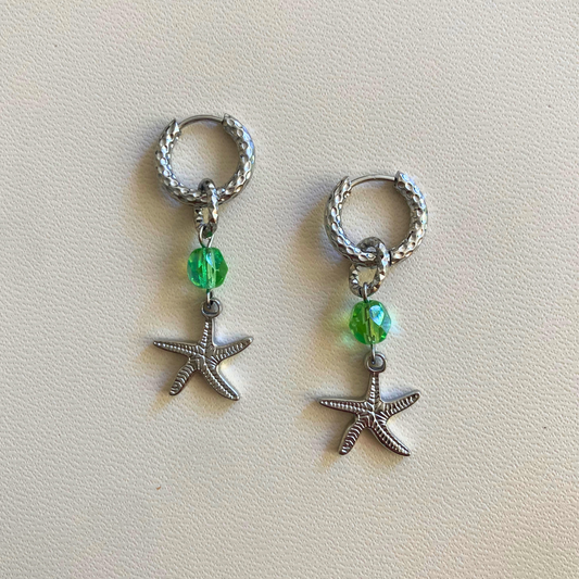 Créoles ciselées argentées • charm étoile de mer